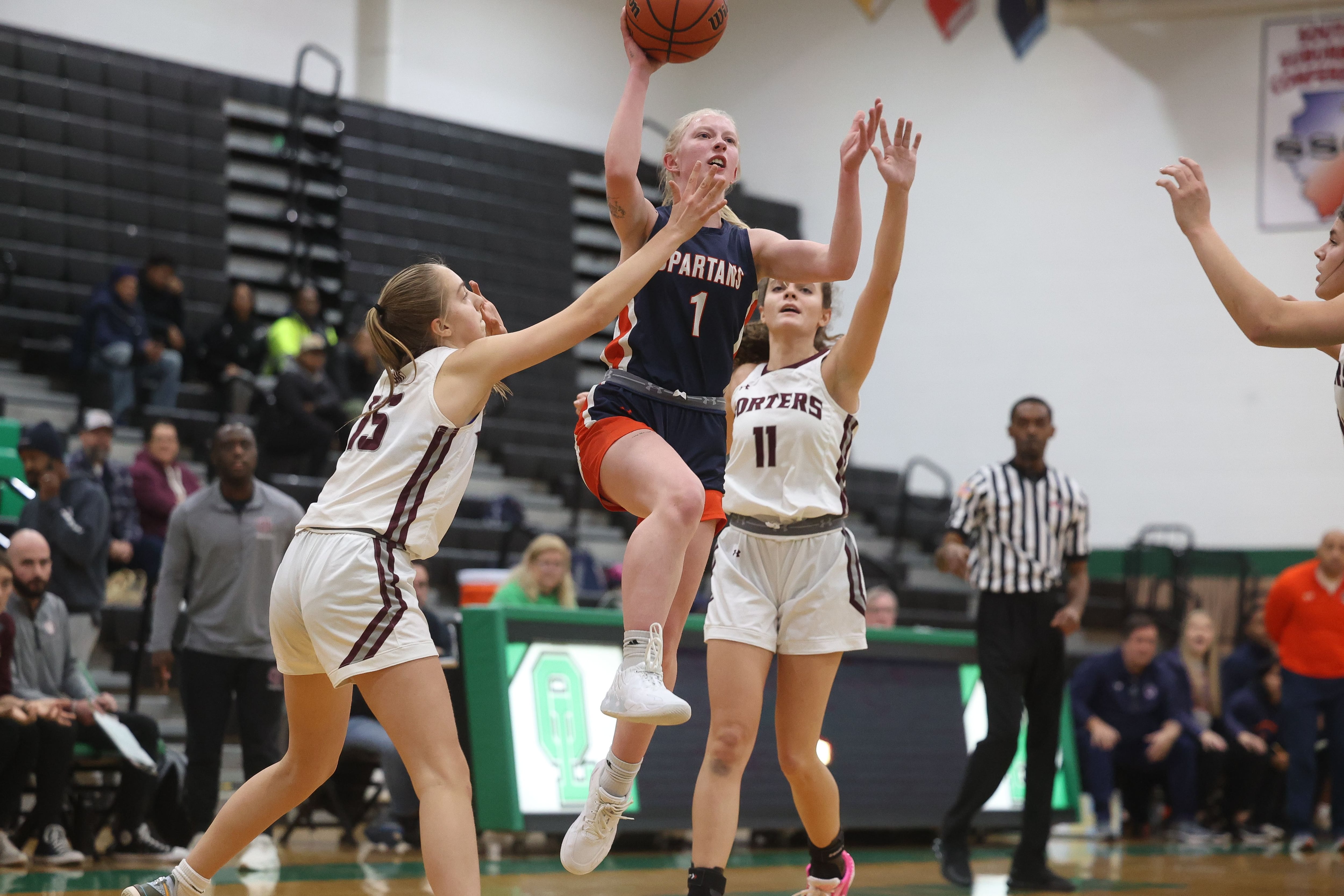 Romeoville’s Emily Gabrelcik goes up for the basket against Lockport in the Oak Lawn Holiday Tournament championship on Saturday, Dec.16th in Oak Lawn.