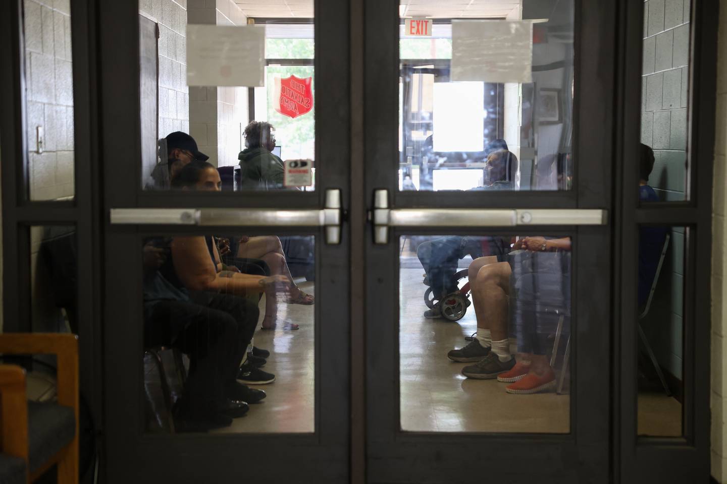 People wait their turn to shop the food pantry at The Salvation Army in Kankakee on Tuesday, June 10, 2025. Kankakee's Lt. LaToya Surratt said they currently have about half of what they need for the number of individuals seeking food assistance.