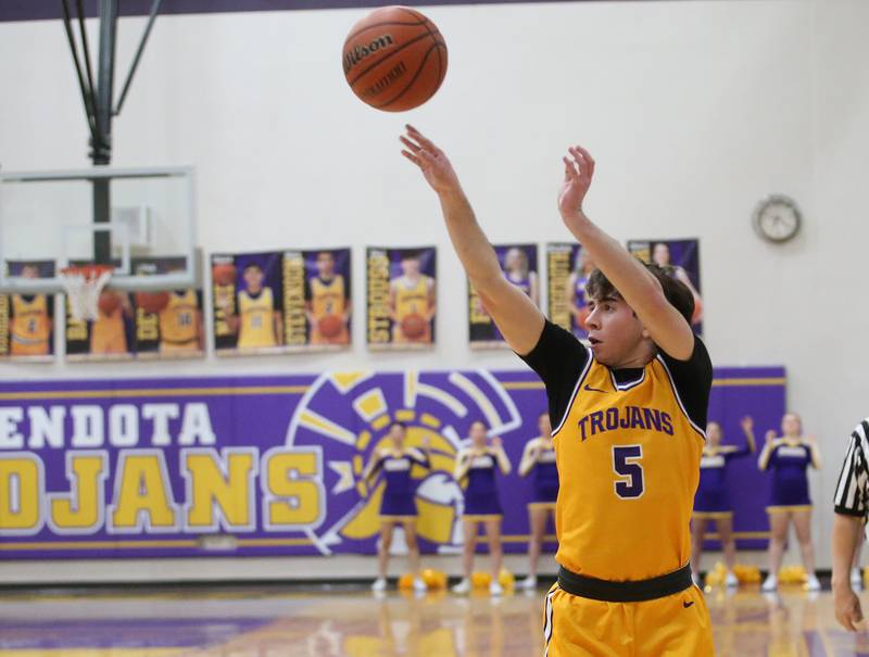 Mendota's Cameron Kelly shoots a wide-open shot against Ottawa on Tuesday, Feb. 13, 2024 at Mendota High School.