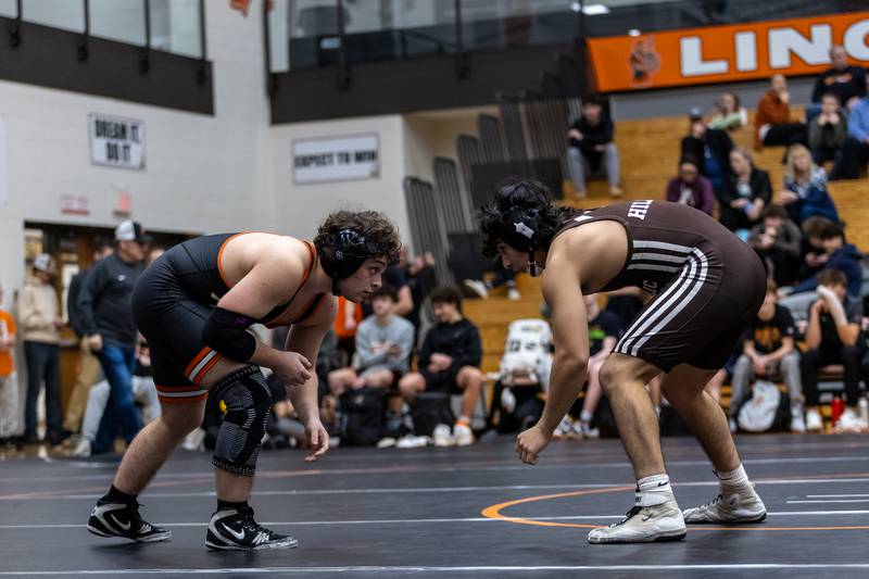 Lincoln-Way West’s Evan Gutierrez and Joliet Catholic’s Aurelio Munoz compete in the 157 pound match at Lincoln-Way West on Jan. 8, 2026.