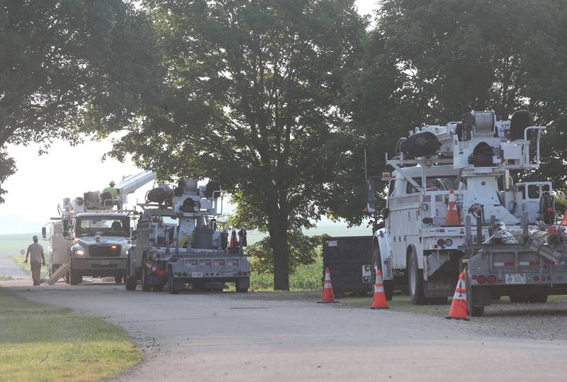 Ameren crews replace a power pole on South Street on Monday, June 17, 2024 in Dover. Streamline winds knocked out power to the town.  Down limbs, power lines closed roads in the town.