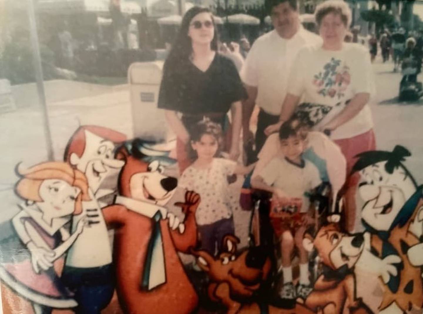 Former Joliet resident Carol Juricic is shown with her husband Bill, oldest daughter Jeanette, daughter Sheila and son Bill at Disney World in Florida before Bill's death. Sheila and Paul cared for more than 250 foster children in their home over 25 years and adopted four children.