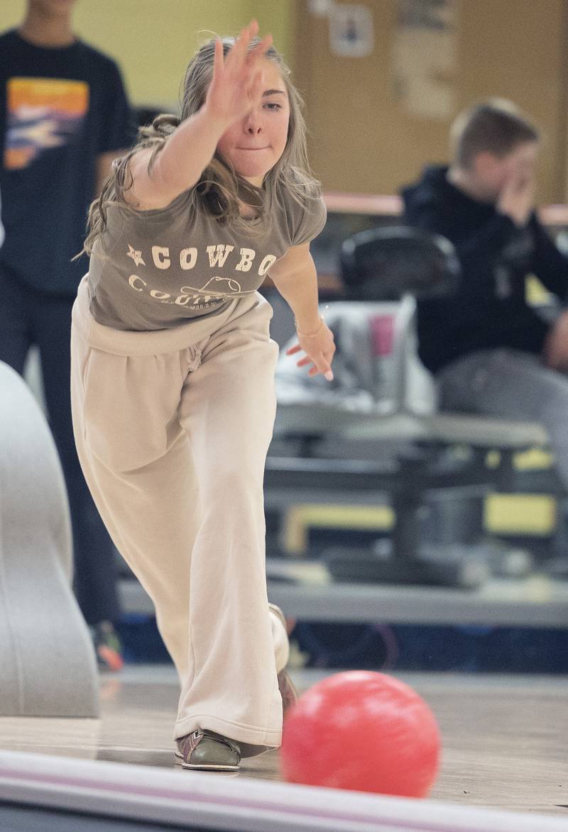 Harper Ford, eighth grader at St. Mary’s School in Sterling, fires a ball down the lane Tuesday, Jan. 28, 2025.