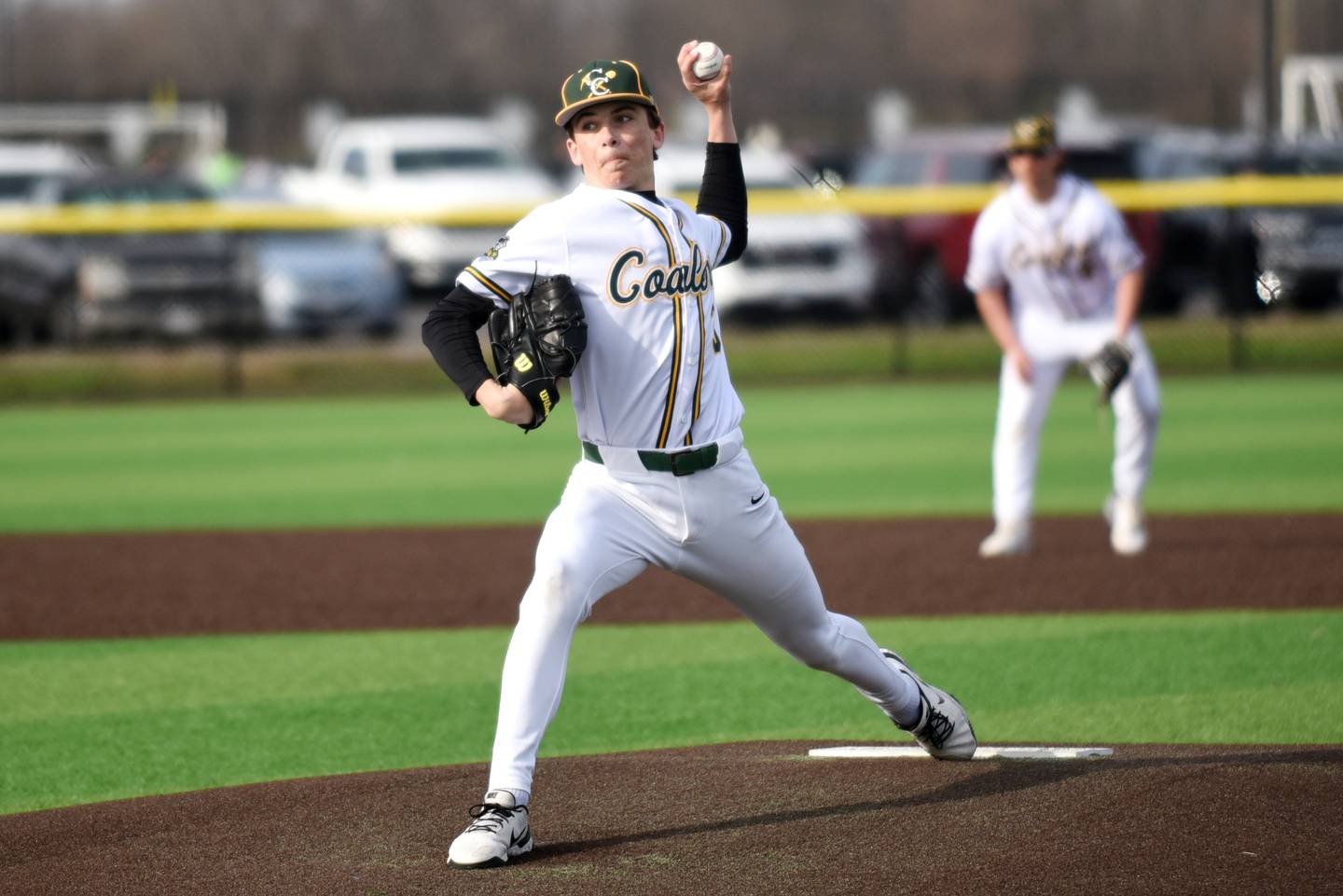 Coal City's Lance Cuddy throws a pitch during a home game against Bishop McNamara Thursday, April 3, 2025.