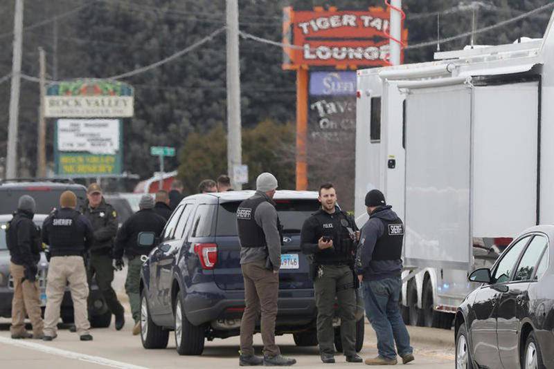 Police flood North Bell School Road after an officer-involved shooting Thursday morning inRockford. A McHenry County Sheriff’s deputy was shot and later died.