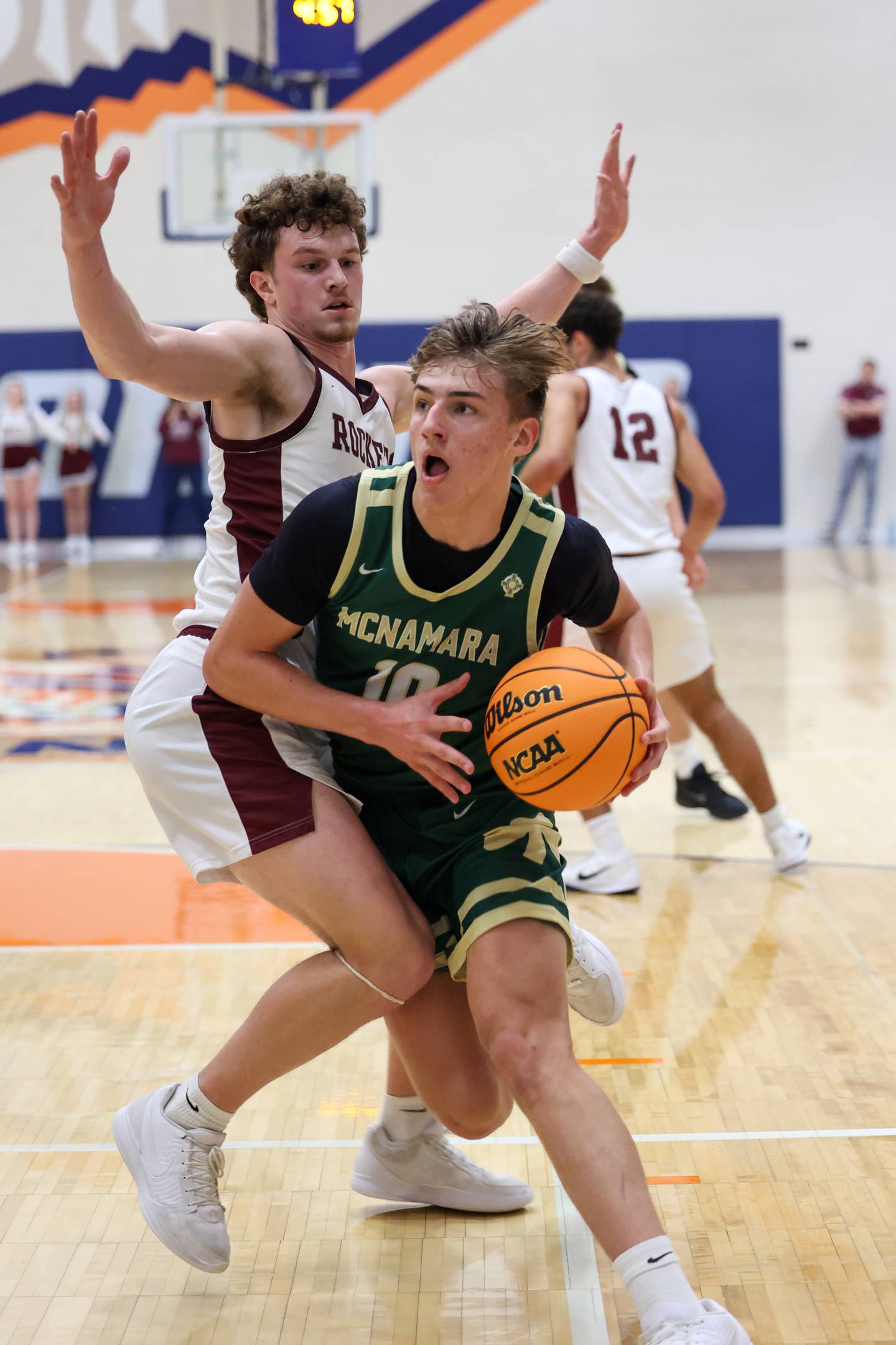 Bishop McNamara's Coen Demack drives to the basket during the Fightin' Irish's 77-70 loss to Tolono Unity in the IHSA Class 2A Pontiac Supersectional on Monday, March 9, 2026.