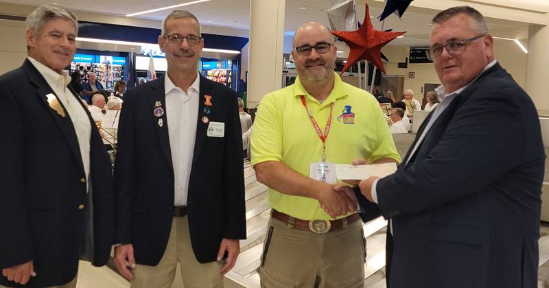 The Honor Flight Chicago program receiving a $3,500 donation from the Illinois Elks Association