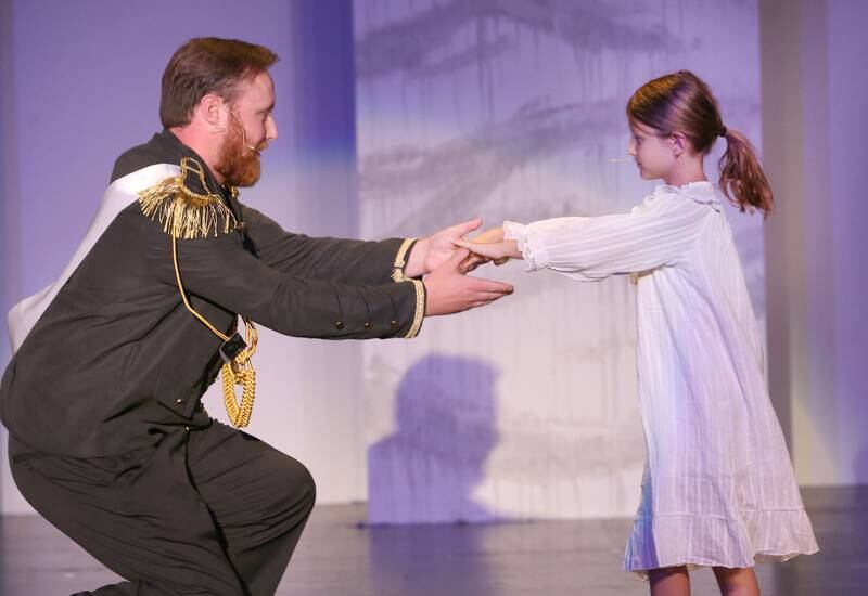 Griffin Tabor as Tsar Nicholas and Elois Gatza as Little Anastasia acts out a scene during a rehearsal of "Anastasia" on Tuesday, July 3, 2024 at Stage 212 in La Salle. The show runs July 12-14, 19-21 and 26-28 at Stage 212, 700 First St., LaSalle. Friday and Saturday evening performances begin at 7:30 p.m. and Sunday matinees begin at 2 p.m.