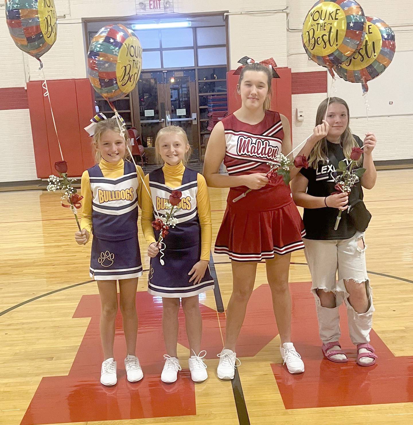 "All-American Cheerleaders" selected at the 2024 Malden Invitational were Austyn Britton (from left) and Charleigh Philbrook from Ohio and Krishlyn Lanham and Quinnlyn Peach from Malden.