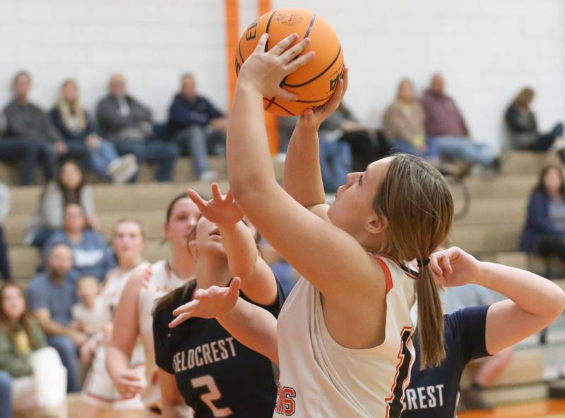 Flanagan-Cornell/Woodland's Macey Nutgrass eyes the hoop against Fieldcrest during the Falcon-Irish Thanksgiving Tournament on Monday, Nov. 18, 2024 at Flanagan High School.