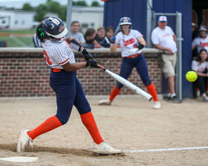 Oswego's Jaelynn Anthony (20) connects on a pitch during Class 4A Oswego Regional final softball game between Yorkville at Oswego. May 24th, 2024.