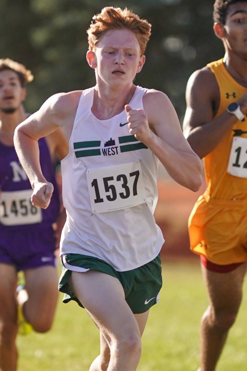 Glenbard West’s Liam Grady competes in the Eddington cross country invitational at Kaneland High School in Maple Park on Saturday, Sep 21, 2024.