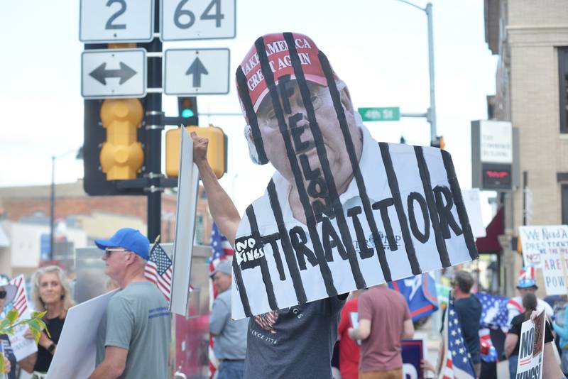 This was one of the signs at the  "Workers Over Billionaires" rally in downtown Oregon on Monday, Sept. 1, 2025. Monday's event also included pro-Trump signs.