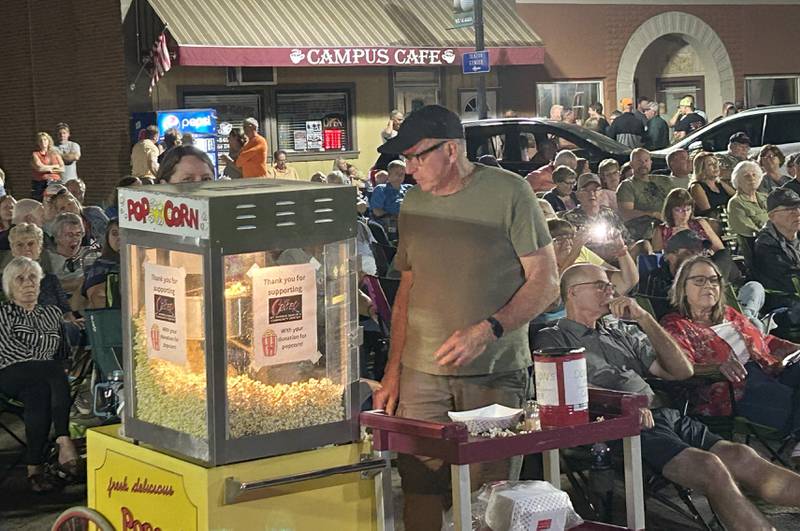 Bill Nicholson helped pop popcorn for the Mt. Morris Senior & Community Center on Friday, Aug. 22, 2025 as Heartache Tonight, an Eagles tribute band, played at the Jamboree Concert Series.