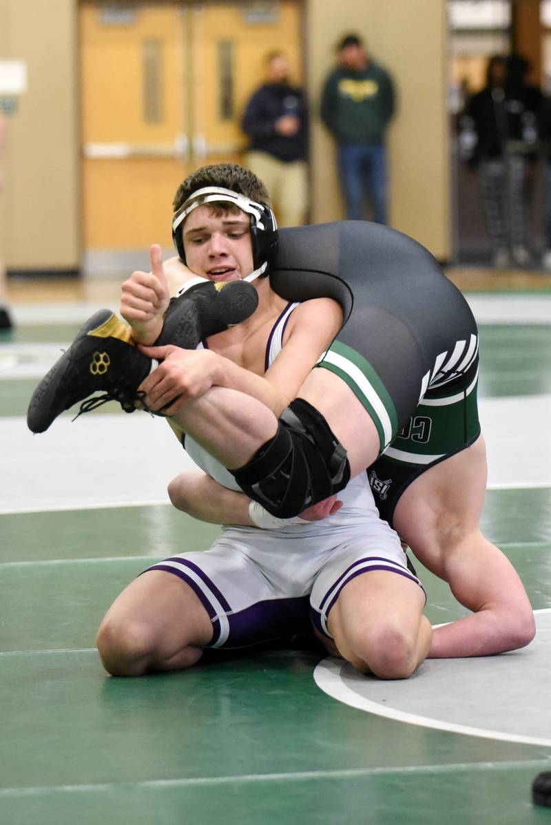 Wilmington's Logan Van Duyne, left, grapples with Coal City's Cade poyner during the 190-pound third-place match at the IHSA Class 1A Coal City Sectional Saturday, Feb. 15, 2025.