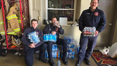 Rochelle library, DAR honor First Responders Day with quilts, water donation