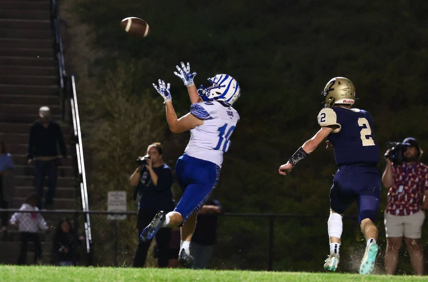 Princeton senior Ryan Jagers hauls in a 21-yard reception on the last play of the first quarter in Friday's Three Rivers Conference crossover at Aledo. The Tigers defeated Mercer County 41-22.