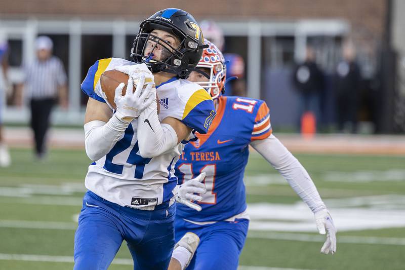 Tri-Valley’s Colton Prosser hauls in pass to put the Vikings deep in the Bulldogs territory late in the game against St. Teresa Decatur in the class 2A IHSA football state championship game Friday, Nov. 25, 2022.