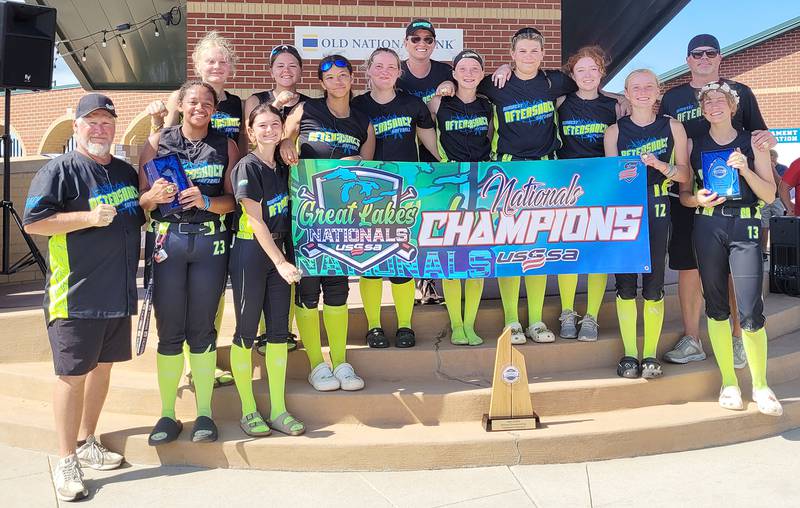 The Midwest Aftershock 16U travel team poses with the championship trophy after winning the title at the USSSA Great Lakes Nationals in Evansville, Indiana, in July. Team members were Ayla Kiper, Cheyenna Wilkins, Jordan Rogula, Jayden Moss, Josie Yakey, Ella Ingram, Jenna Yakey, Anna Viel, Jordan Hanserd, Jenna Warren and Vern Gilley-Amdal.