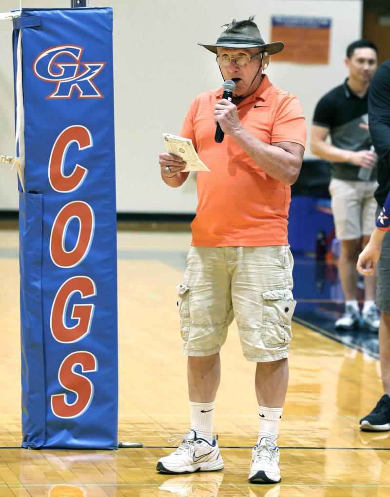 U.S. Navy veteran Jim Kush announces the starters for the Genoa-Kingston volleyball team Tuesday, Sept. 5, 2023, before working as the official score keeper during the game. Kush also has sung the national anthem at Genoa-Kingston sporting events.