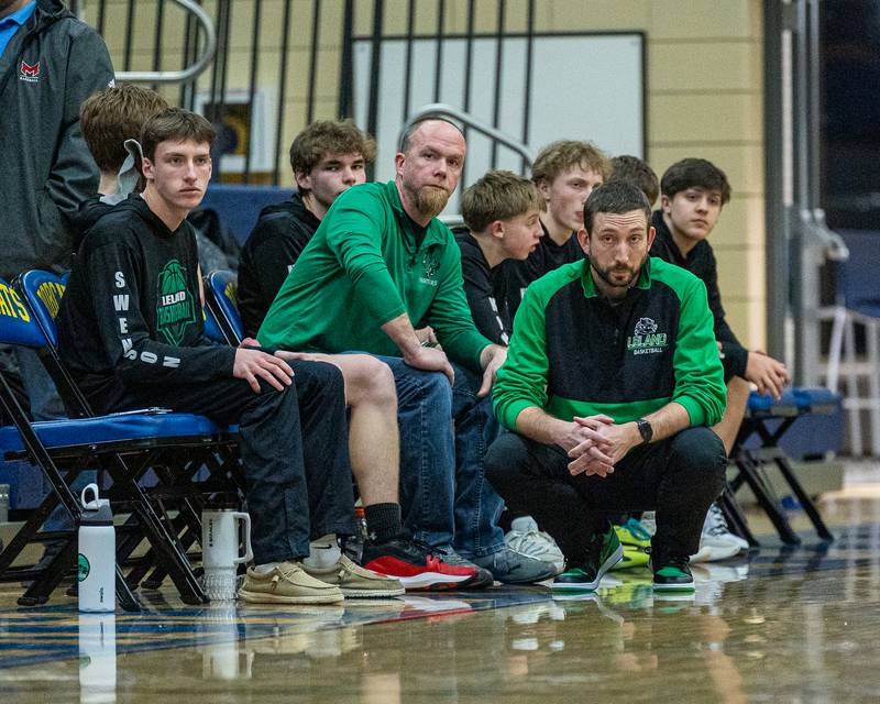 Leland's Head Coach Pat Torman and bench watch game from sideline in game against Newark in the quarterfinals of the Little Ten Conference Tournament on Monday, Feb. 2, 2026 at Somonauk High School in Somonauk.