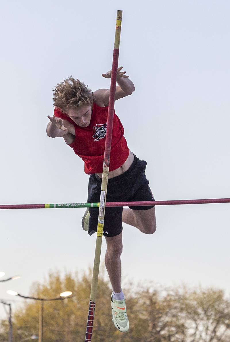 Ottawa’s Lucas Goetz clears the bar in the pole vault Thursday, April 25, 2024 at the Sterling High School Night Relays.