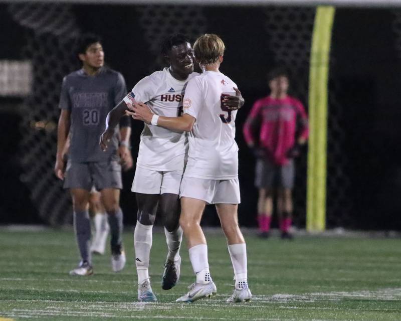 Naperville North's Hindo M allie (6) and Josh Pedersen (9) celebrate a goal during soccer match between Naperville North at Morton.  Sept 21, 2023.