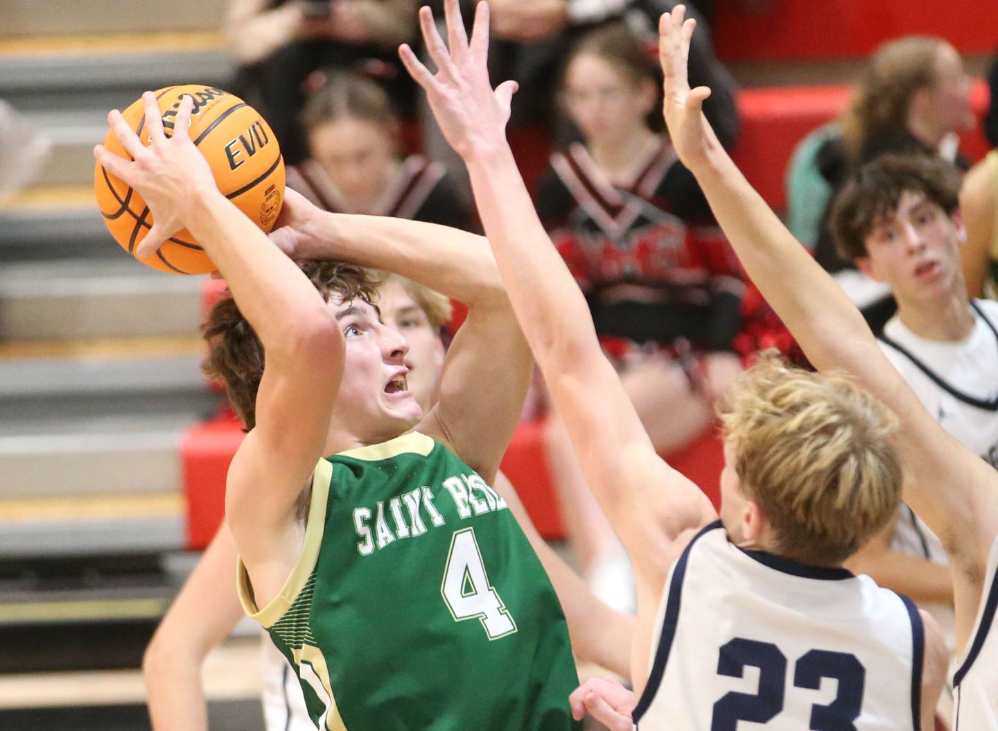 St. Bede's Gino Ferrari eyes the hoop as Ridgeview's Carter Beck defends during the Route 17 Classic Tournament on Wednesday, Nov. 27, 2024 at Woodland High School.