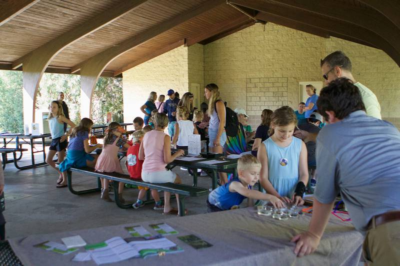 Families enjoy crafts at Westmont Library Moanarch Festival at Ty Warner Park on Saturday, Sept. 23,2023 in Westmont.