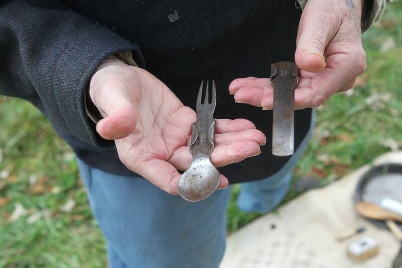 Herman Stipp, of Sandwich shows eating utensils used by soldiers during the Civil War at Hainesville’s Civil War Encampment & Battle at the Northbrook Sports Club on October 21st in Hainesville. 
Photo by Candace H. Johnson for Shaw Local News Network