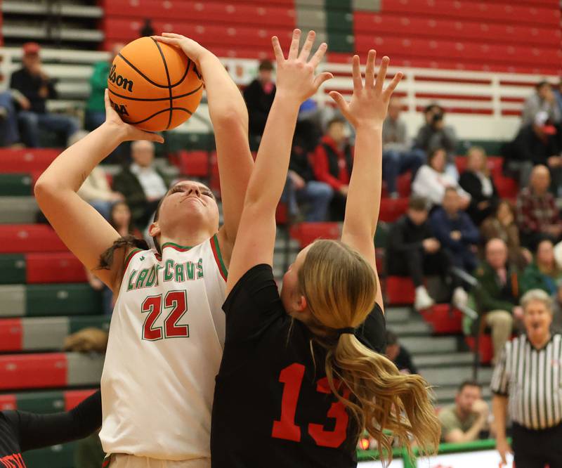 L-P's Brianna Ruppert eyes the hoop as Hall's Caroline Morris defends on Monday, Jan. 12, 2026 in Sellett Gymnasium at L-P High School.