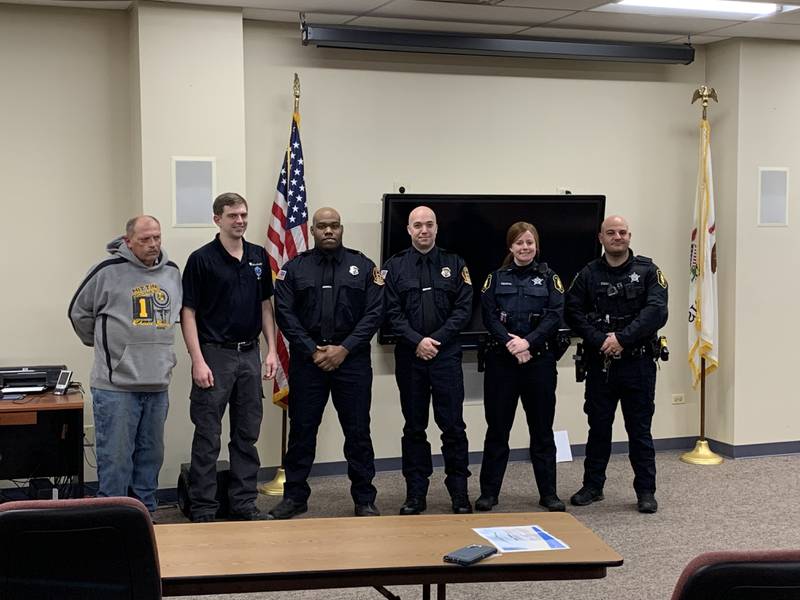 Members of the Harvard Fire Protection District and Harvard Police Department were honored on Thursday, Jan. 6, 2022, for their life-saving efforts to help a stabbing victim.