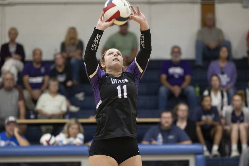 Dixon’s Presley Lappin sets the ball against Newman Thursday, Oct. 3, 2024, at Newman High School.