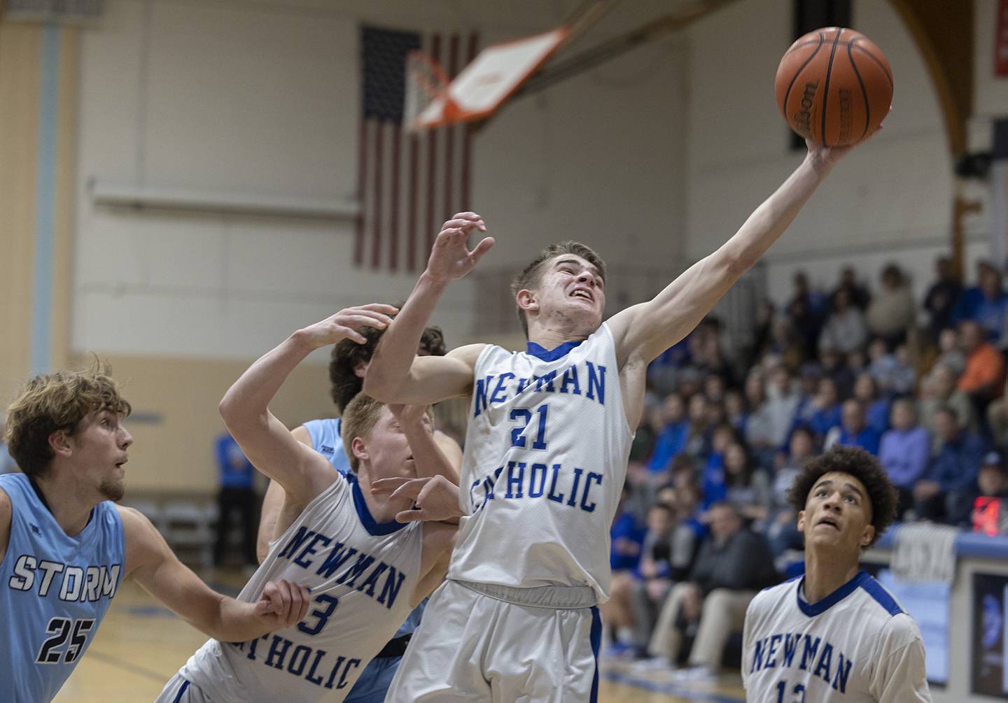 Newman’s Eli Attig pulls down a rebound against Bureau Valley Friday, Jan. 26, 2024 at Newman High School.