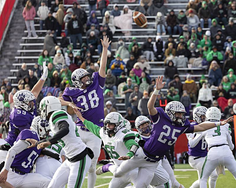 The Wilmington line looks to block a field goal by Athens Friday, Nov. 24, 2023 in the 2A state football championship game at Hancock Stadium in Normal.