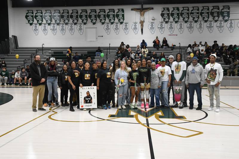 Bishop McNamara honors senior players with their families on Senior Night during the Bishop McNamara's game against Joliet Catholic on Wednesday, Feb. 11, 2026.