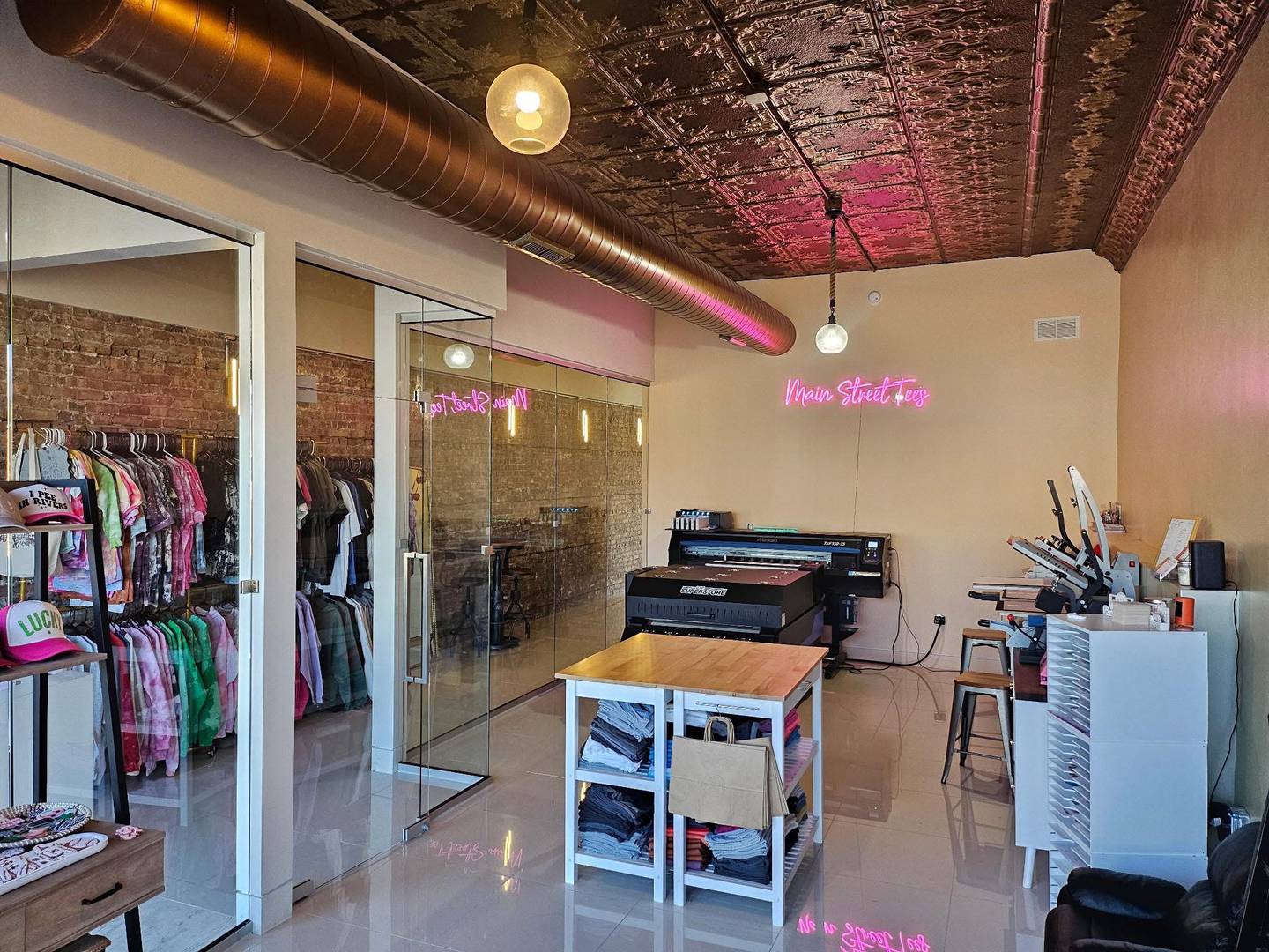 In addition to offering apparel, owner Alicia Percudani serves clients with a commercial direct-to-film printer at Main Street Tees at 250 N. Main St. in Seneca. She also takes part in the 3 French Hens monthly market.