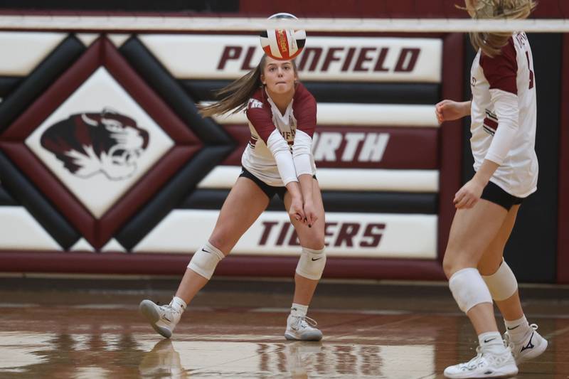 Plainfield North’s Christian Petkus digs out a shot against Plainfield East on Thursday night.