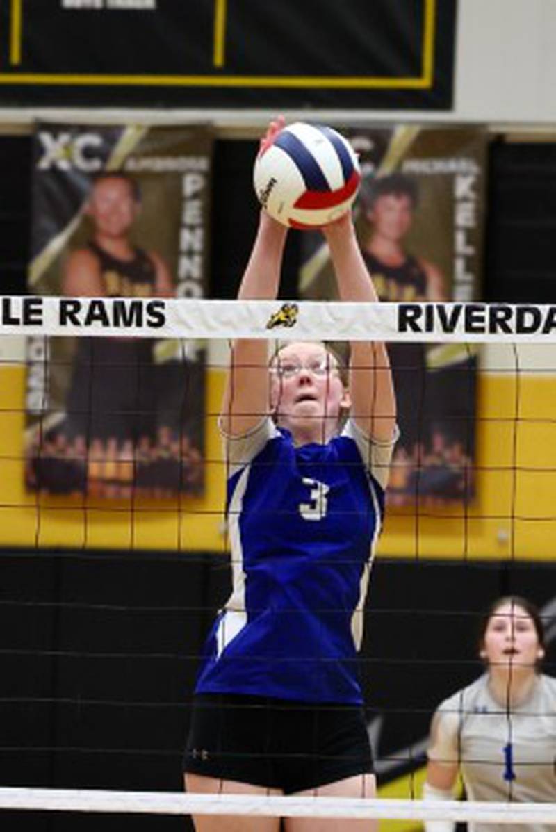 Princeton's Danika Burden makes a block against Peoria Notre Dame in Tuesday's sectional semifinals at Riverdale.
