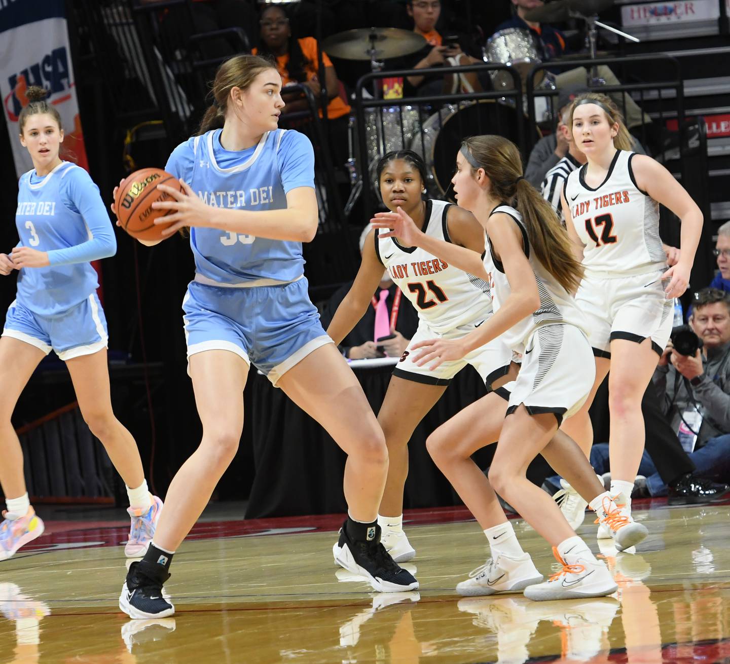 Breese Mater Dei's Alyssa Koerkenmeier (33) looks to the basket as Byron's Macy Groharing defends during the 2A championship at Redbird Arena in Normal on Saturday, March 4.