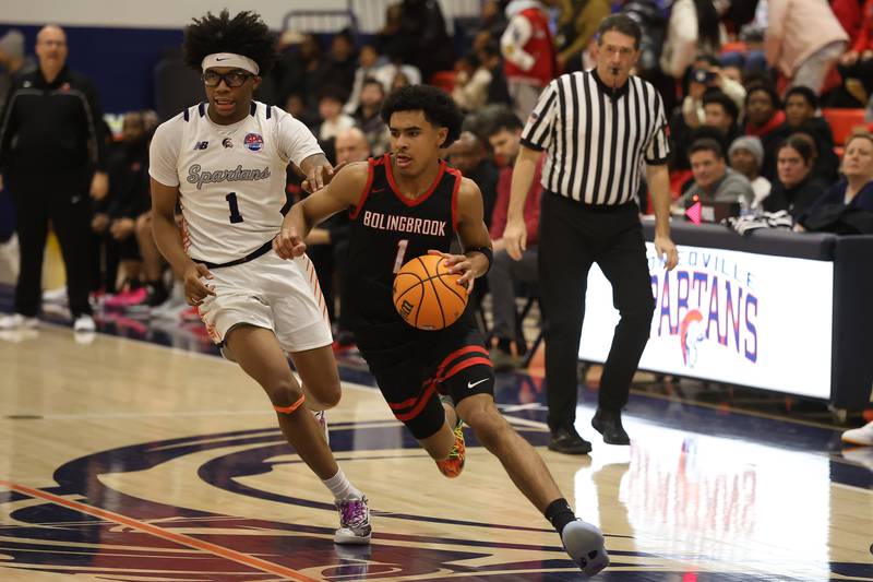 Bolingbrook's Brady Pettigrew drives to the basket against Romeoville on Tuesday, Dec. 2, 2025 in Romeoville.