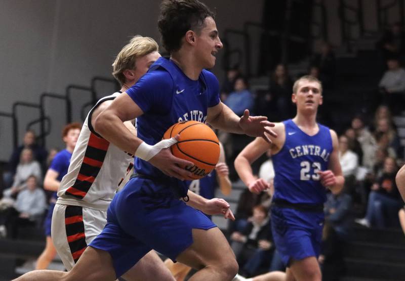 Burlington Central’s Lucas Kerr drives with the ball in varsity boys basketball on Tuesday, Feb. 4, 2025, at  McHenry High School  in McHenry.