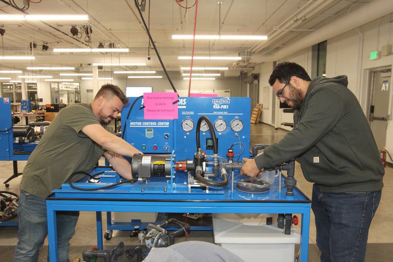 Alex Lowe, of Lakemoor and Moises Garcia, of Round Lake work together testing pumps for their centrifugal pumps lab using a pump system trainer at the College of Lake County Advanced Technology Center (ATC) on November 16th in Gurnee.
Photo by Candace H. Johnson for Shaw Local News Network