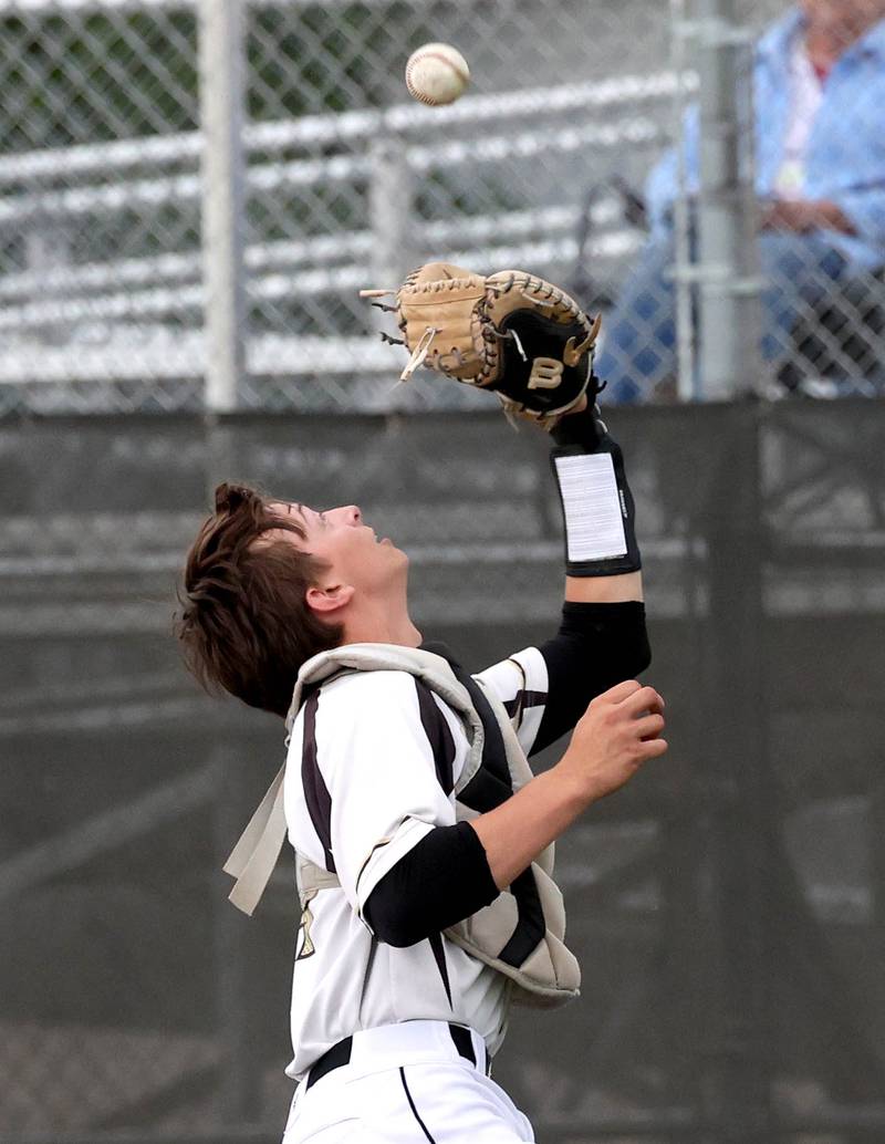Sycamore's Adam Eder catches a foul ball Thursday, May 29, 2025, during their Class 3A regional semifinal game against Dixon at Freeport High School.