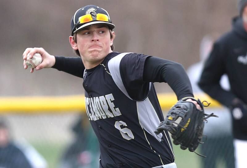 Sycamore's Owen Piazza throws the ball to first during their game Wednesday, April 27, 2022, at Kaneland High School in Maple Park.