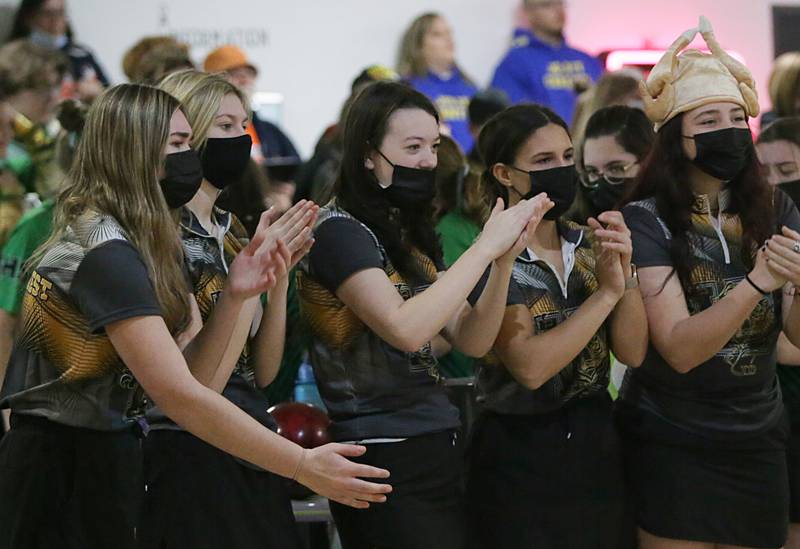 Members of the Joliet West girls bowling team cheer on their teammates at the Illinois Valley Super Bowl on Saturday, Feb. 12, 2022 during the La Salle-Peru Sectional.