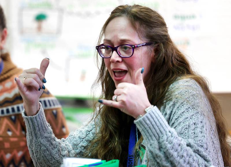 Janet Roschmann, one of the teachers in the two-way dual language program in School District 428, talks Tuesday, March 11, 2025, at Cortland Elementary School, during an informational open house on the subject.