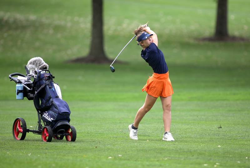Naperville North’s Addy Ciganek hits from the fairway during the Class 2A Glenbard North Regional girls golf meet at Bloomingdale Golf Club on Thursday, Sept. 28, 2023.