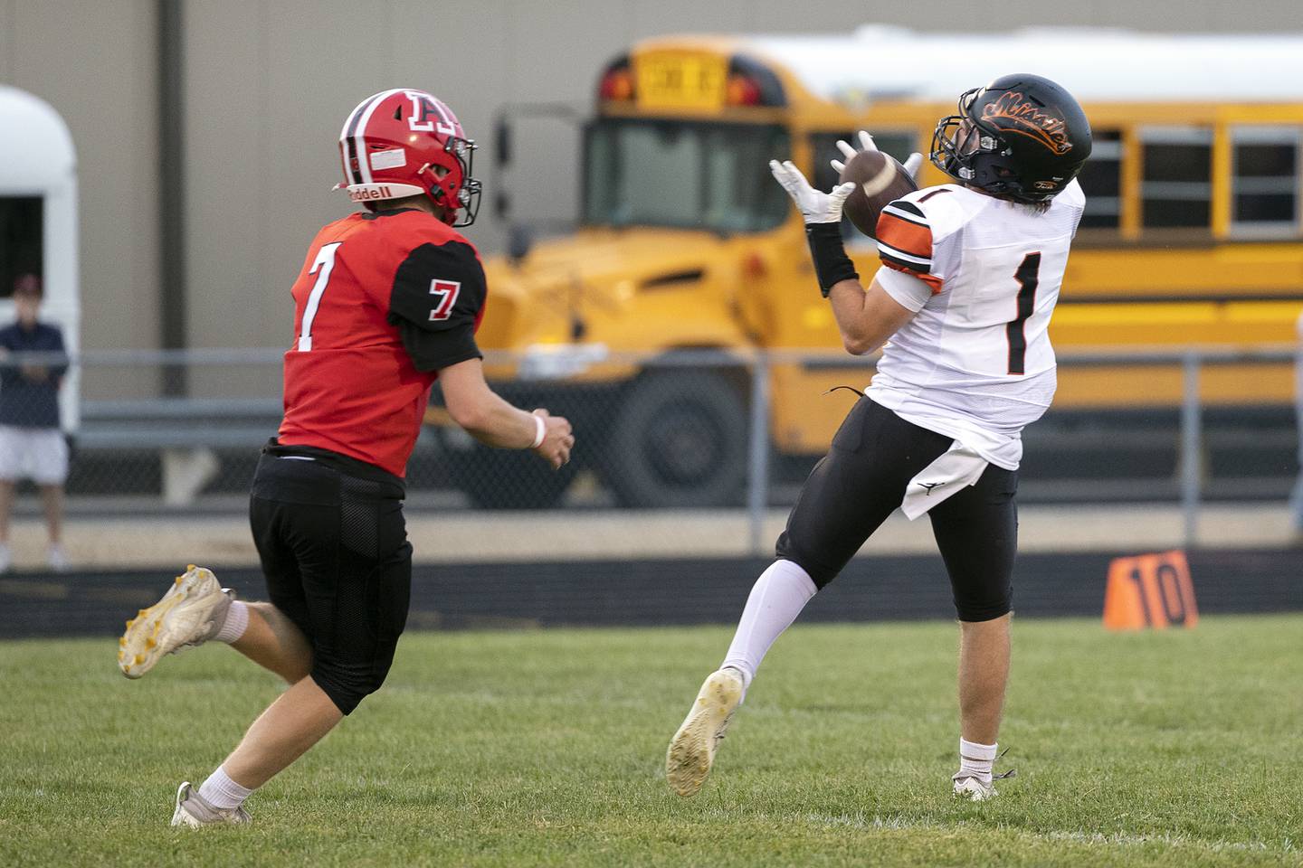 Milledgeville’s  Evan Schenck hauls in a long pass for big yards against Amboy Friday, August 29, 2025, in Amboy.
