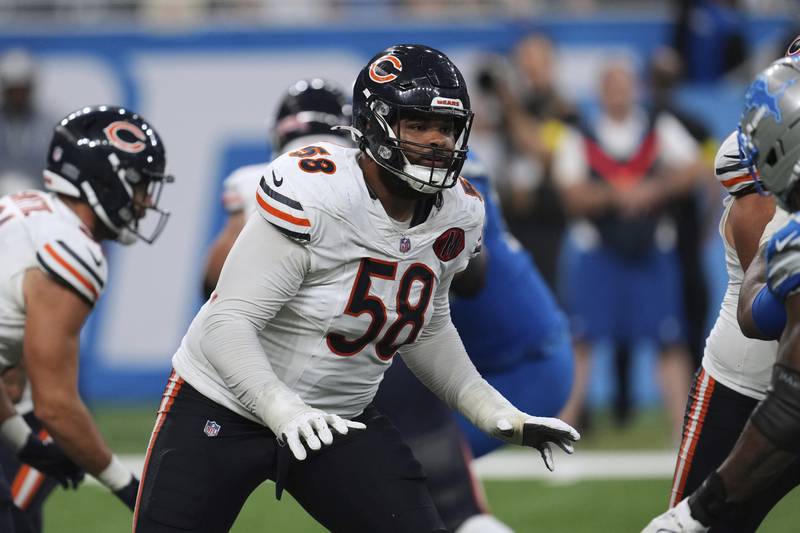 Chicago Bears offensive tackle Darnell Wright (58) plays against the Detroit Lions during an NFL football game in Detroit, Sunday, Sept. 14, 2025. (AP Photo/Paul Sancya)